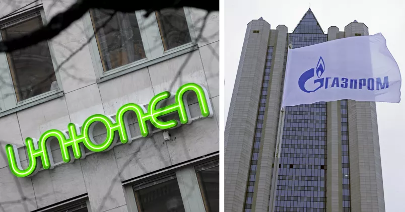 Unionens logga på husfasad. Gazproms logga på flagga.