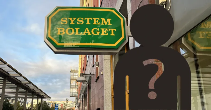 Svart silhuett framför Systembolagsbutik 