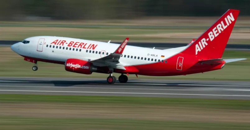 Air Berlin är ett av de lågprisbolag som har lägst andel personalkostnader, enligt norska Arbeidsforskningsinstituttet. Gero Berloer/AP/TT