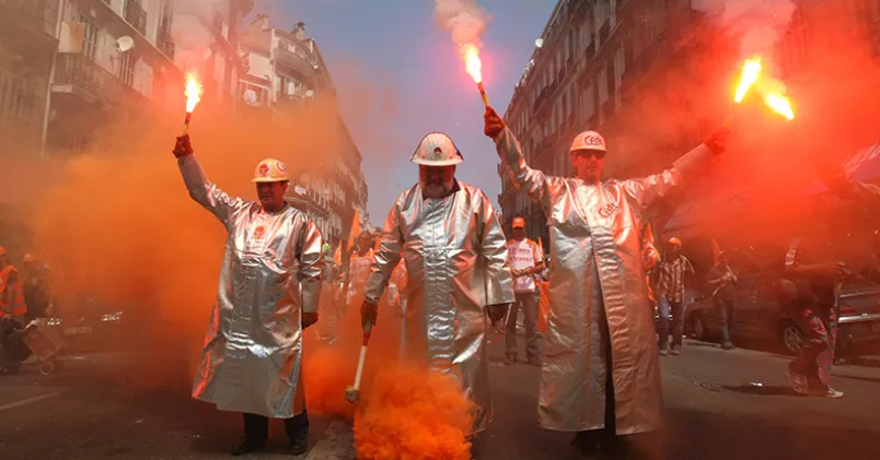 Franska stålarbetare under en strejkprotest mot höjd pensionsålder, sommaren 2010. Claude Paris/AP Photo/TT