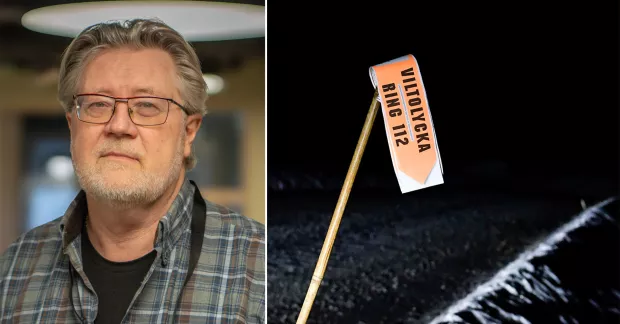 Mikael Joelsson till vänster. Till höger varningsflagga för vilt. 