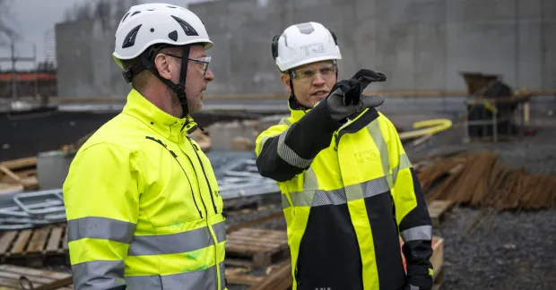 Anställda på en byggarbetsplats. Personerna på bilden har inte med innehållet i artikeln att göra.