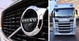 Volvos logga och lastbil från Scania.
