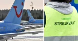 Flygplan och person med väst med texten "strejkvakt".