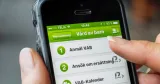 Mobiltelefon som visar Försäkringskassans tjänst för vård av barn, där vab kan anmälas och ersättning sökas.